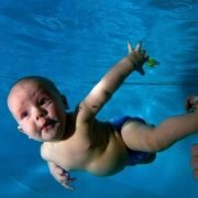 baby-in swimming pool legionella control A Baby swimming in a pool