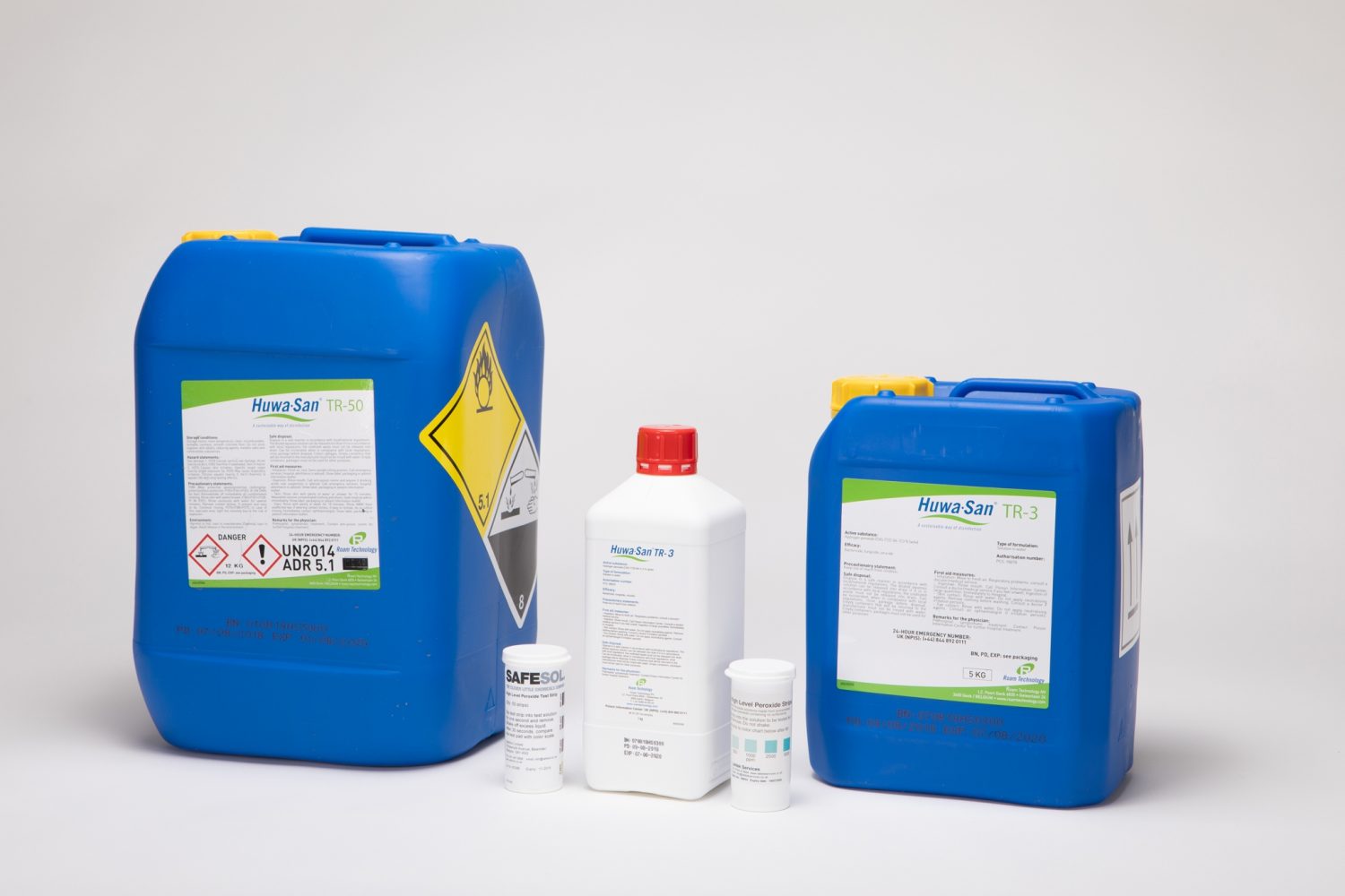 Three Huwa San products with tests strips in the middle
